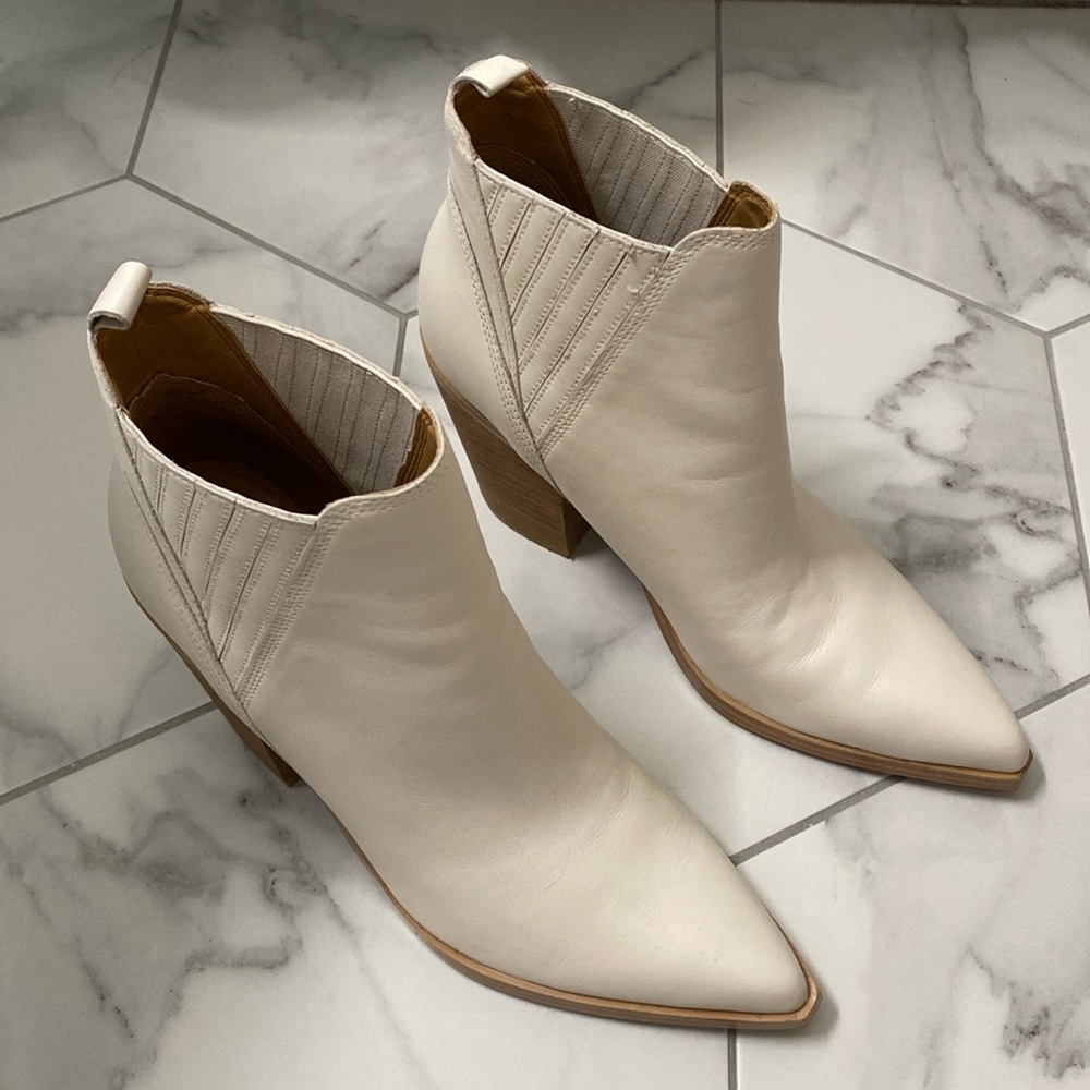 Beautiful bone colored heeled boots